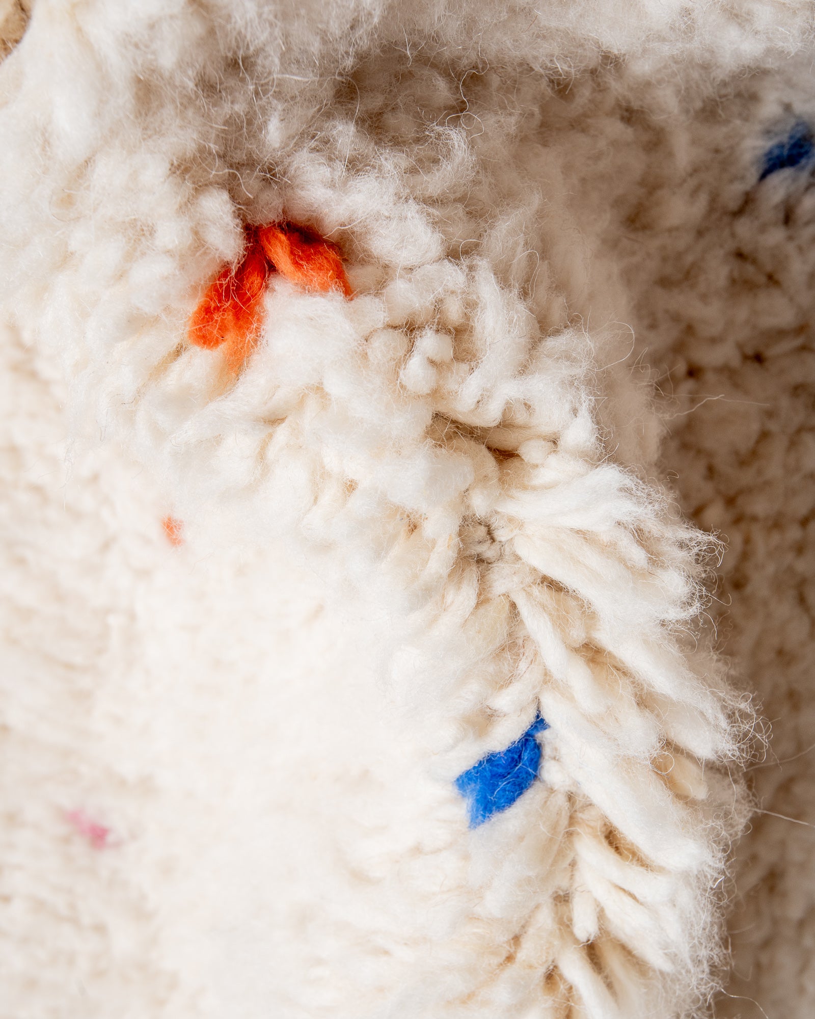 Modern, designer, handcrafted Berber rug from Morocco. Beniourain carpet with beautiful colours and patterns and fluffy wool texture.